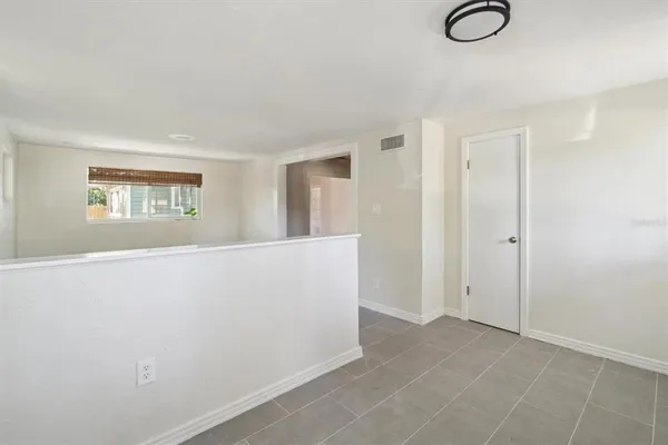 a view of livingroom and hardwood floor