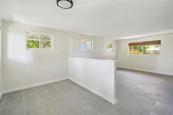 an empty room with windows