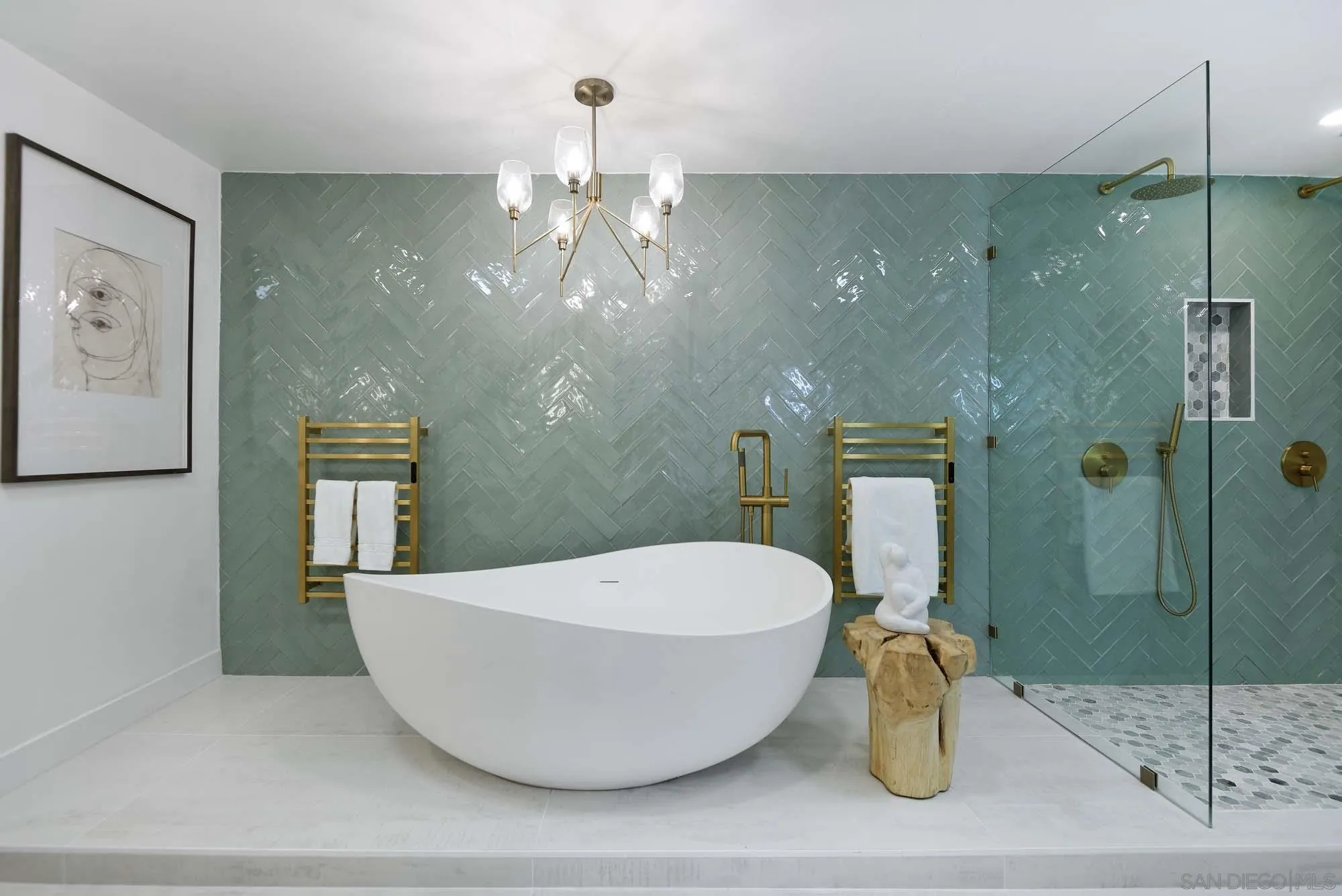 302 Prospect Street, Unit 6 La Jolla, CA 92037 - Photo 15 of 28 a bathroom with a sink and mirror