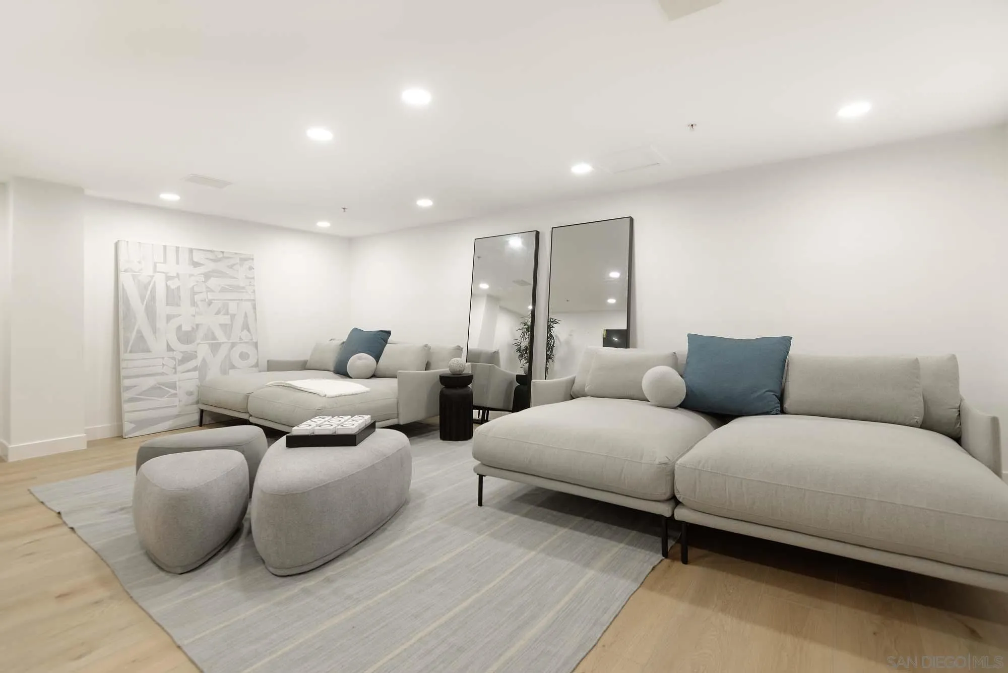 302 Prospect Street, Unit 6 La Jolla, CA 92037 - Photo 19 of 28 a living room with furniture and a couch