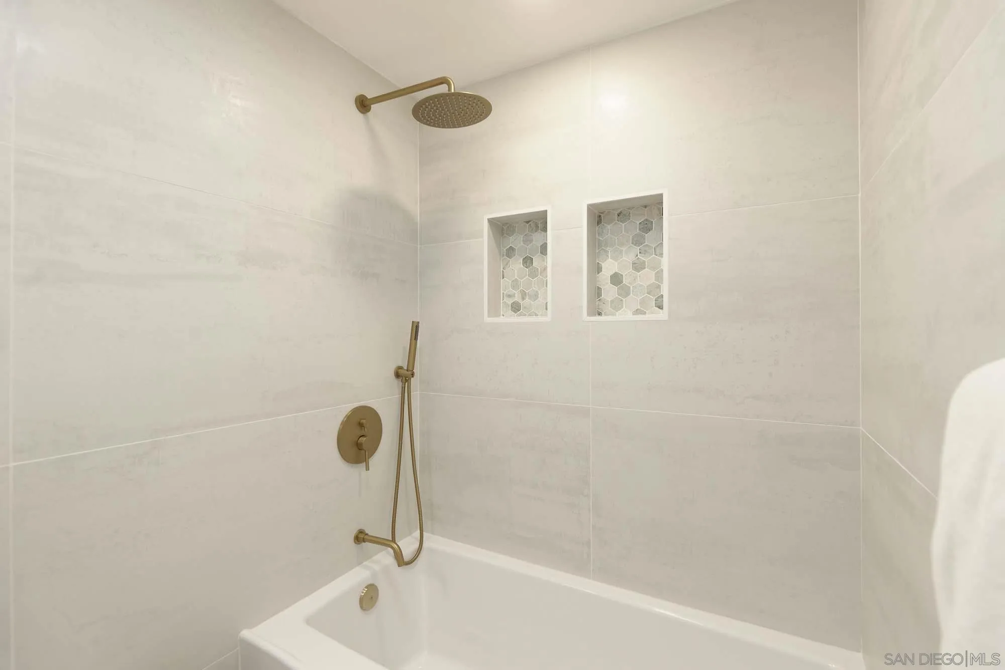 302 Prospect Street, Unit 6 La Jolla, CA 92037 - Photo 21 of 28 a bathroom with a tub and a shower