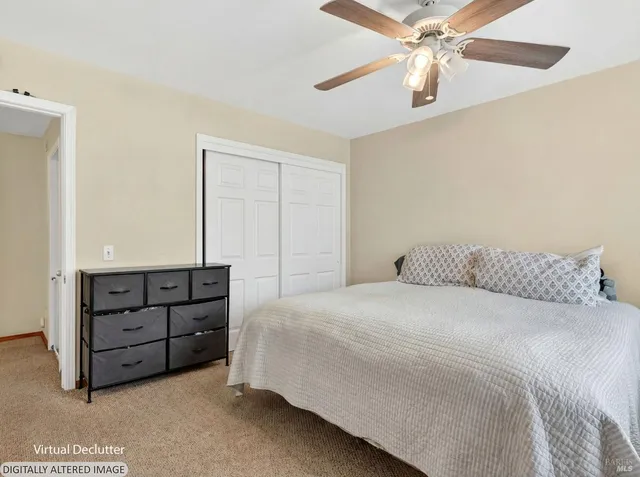 a view of a hallway with a chandelier