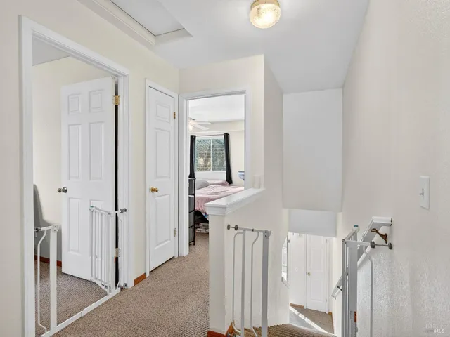 a bed room with a bed and a chandelier