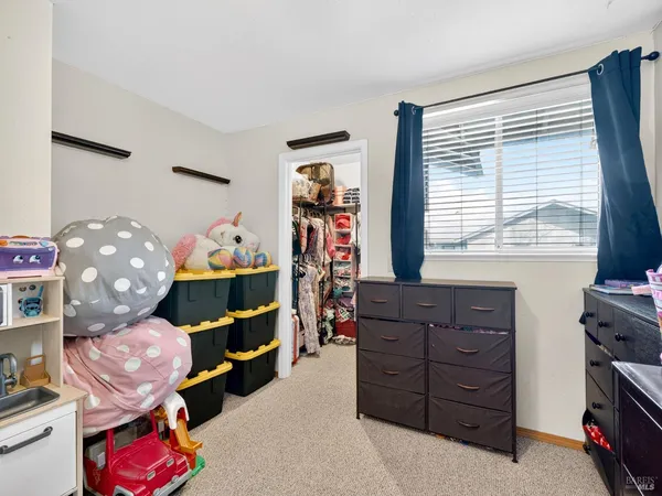 a room with furniture and a window