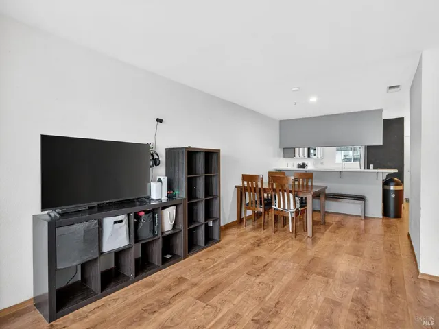 a view of an entryway with wooden floor
