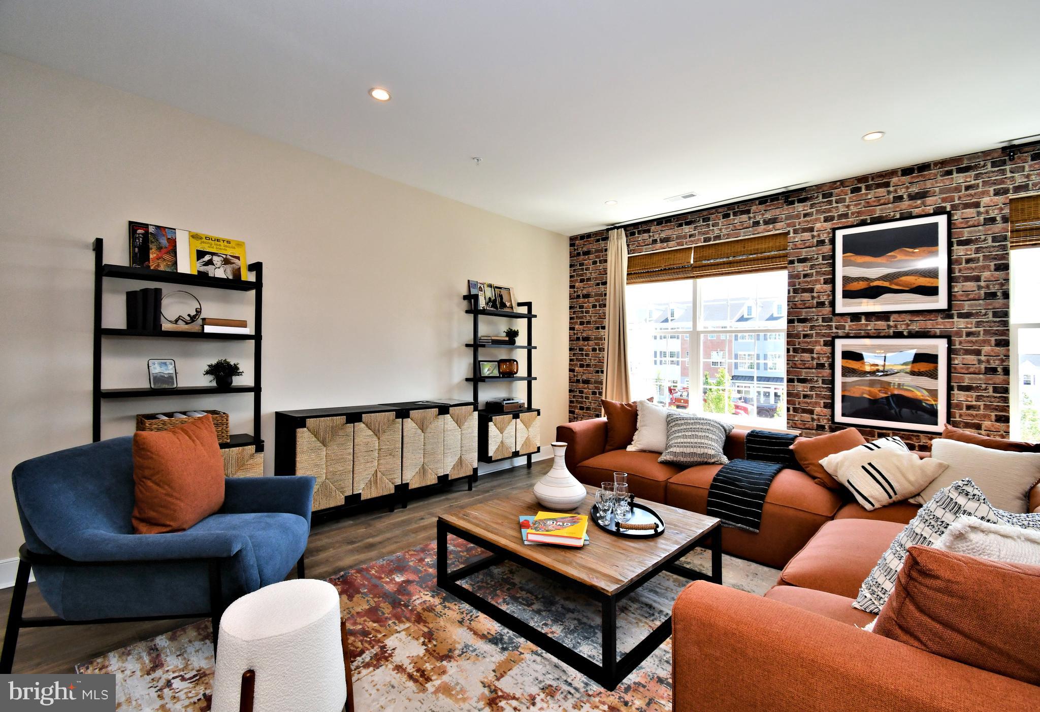 200 Souders Way Souderton, PA 18964 - Photo 12 of 50 a living room with furniture a rug and a large window