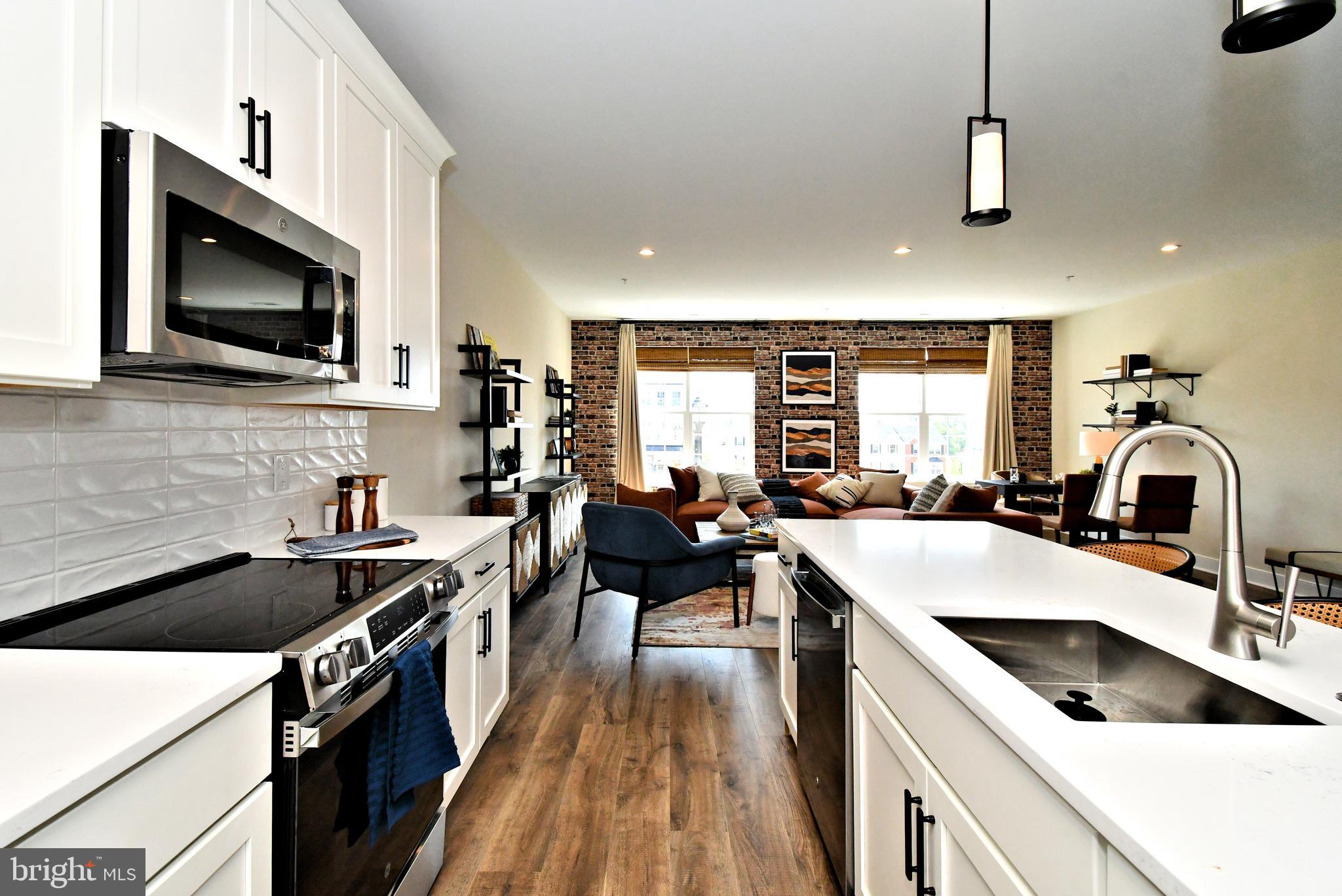 200 Souders Way Souderton, PA 18964 - Photo 18 of 50 a kitchen with a sink stove top oven and microwave