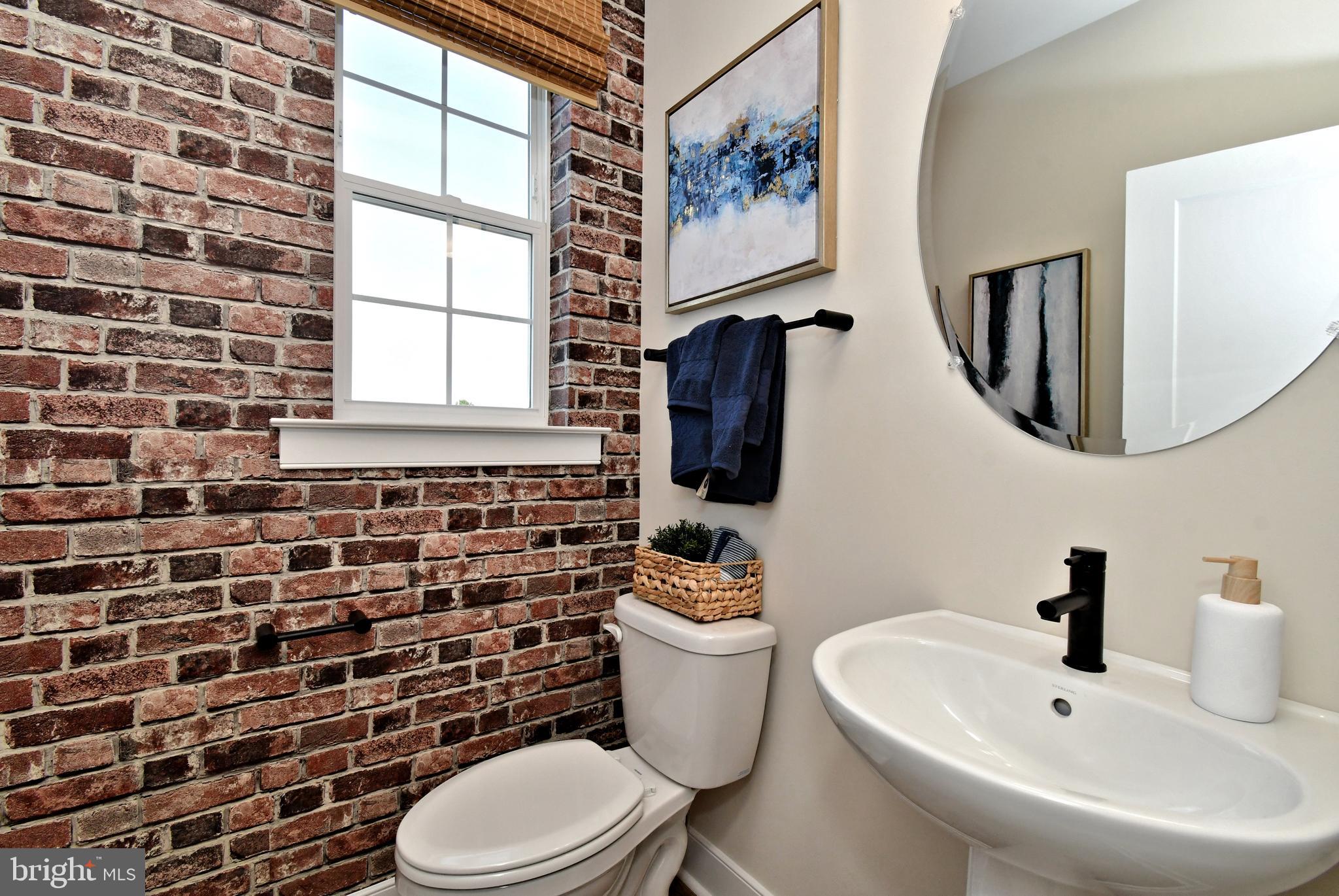 200 Souders Way Souderton, PA 18964 - Photo 23 of 50 a bathroom with a toilet sink and mirror