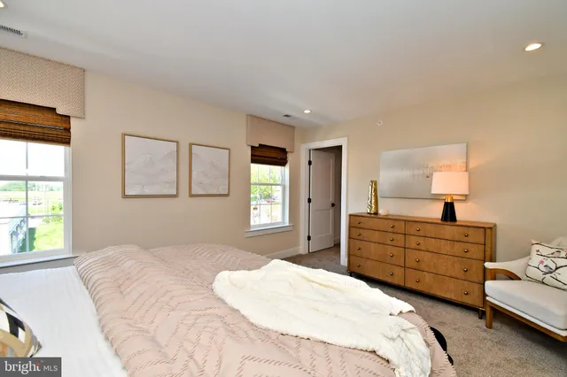 a view of staircase with white walls