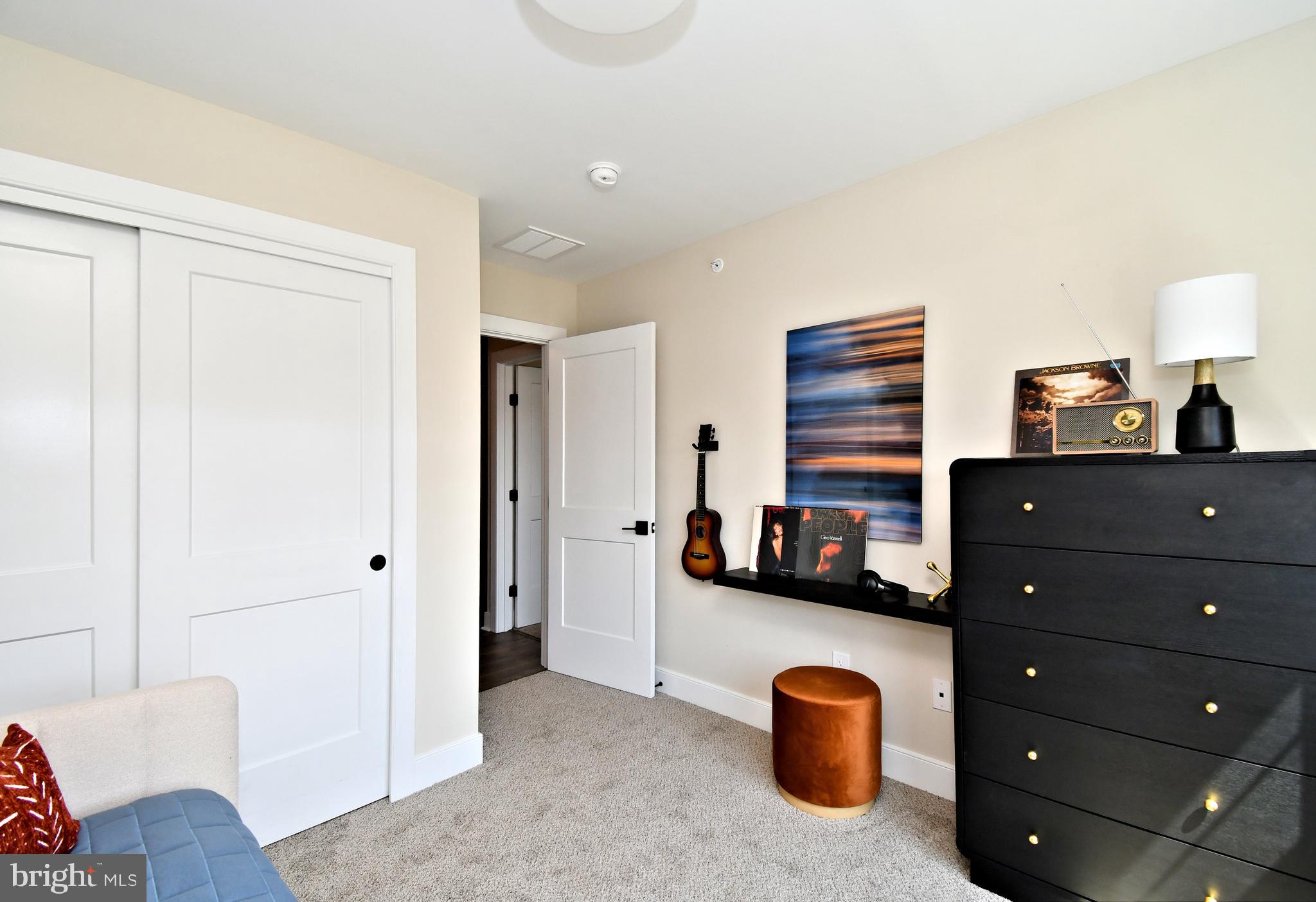 200 Souders Way Souderton, PA 18964 - Photo 38 of 50 a living room with furniture and a lamp