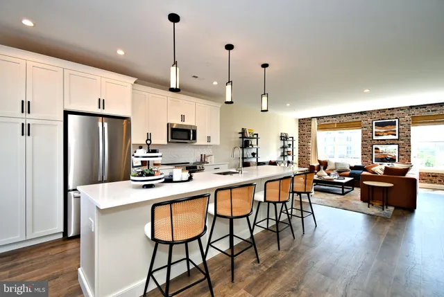 a view of a chairs and a tables in the balcony