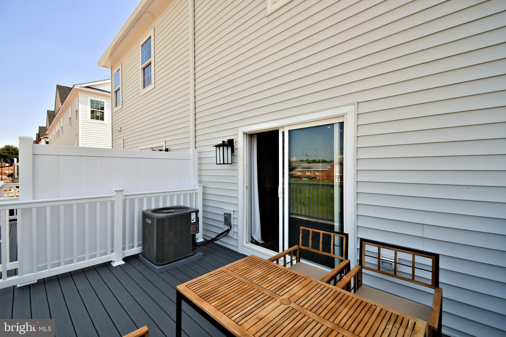 200 Souders Way Souderton, PA 18964 - Photo 47 of 50 a view of a patio with a table and chairs