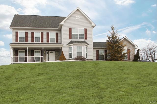 2768 Maefield Road Bath, PA 18014 - Photo 1 of 20 a front view of a house with a garden