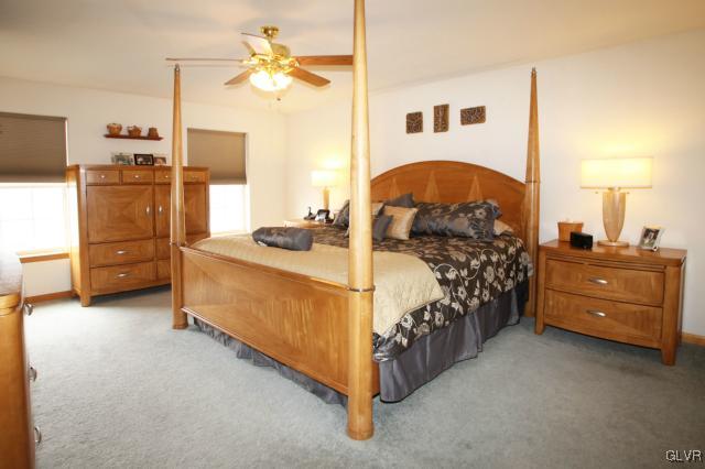 2768 Maefield Road Bath, PA 18014 - Photo 14 of 20 a bedroom with a bed and a chandelier