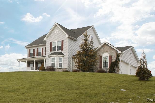 2768 Maefield Road Bath, PA 18014 - Photo 2 of 20 a front view of a house with a garden