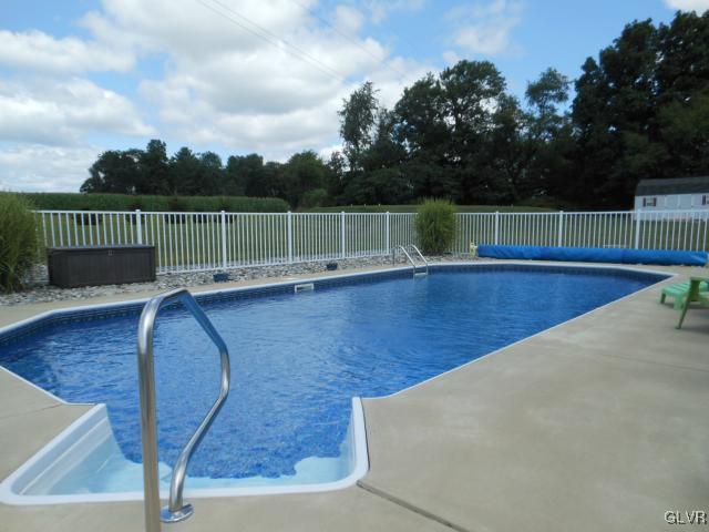 2768 Maefield Road Bath, PA 18014 - Photo 4 of 20 a view of a swimming pool with a chair