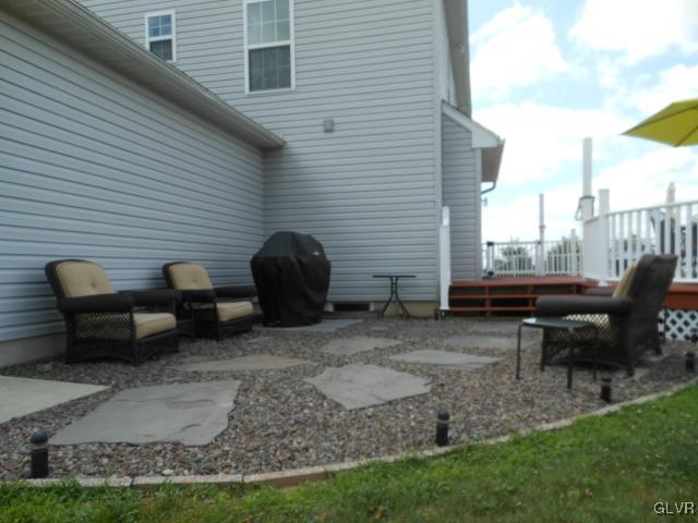 2768 Maefield Road Bath, PA 18014 - Photo 6 of 20 a view of a patio with a chairs and table in a patio