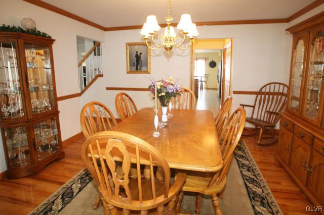 2768 Maefield Road Bath, PA 18014 - Photo 9 of 20 a view of a dining room with furniture and a chandelier