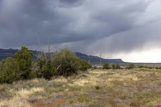 a view of a mountain with a outdoor space