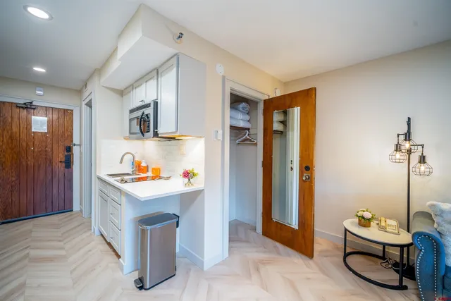 a room with a bed and a window