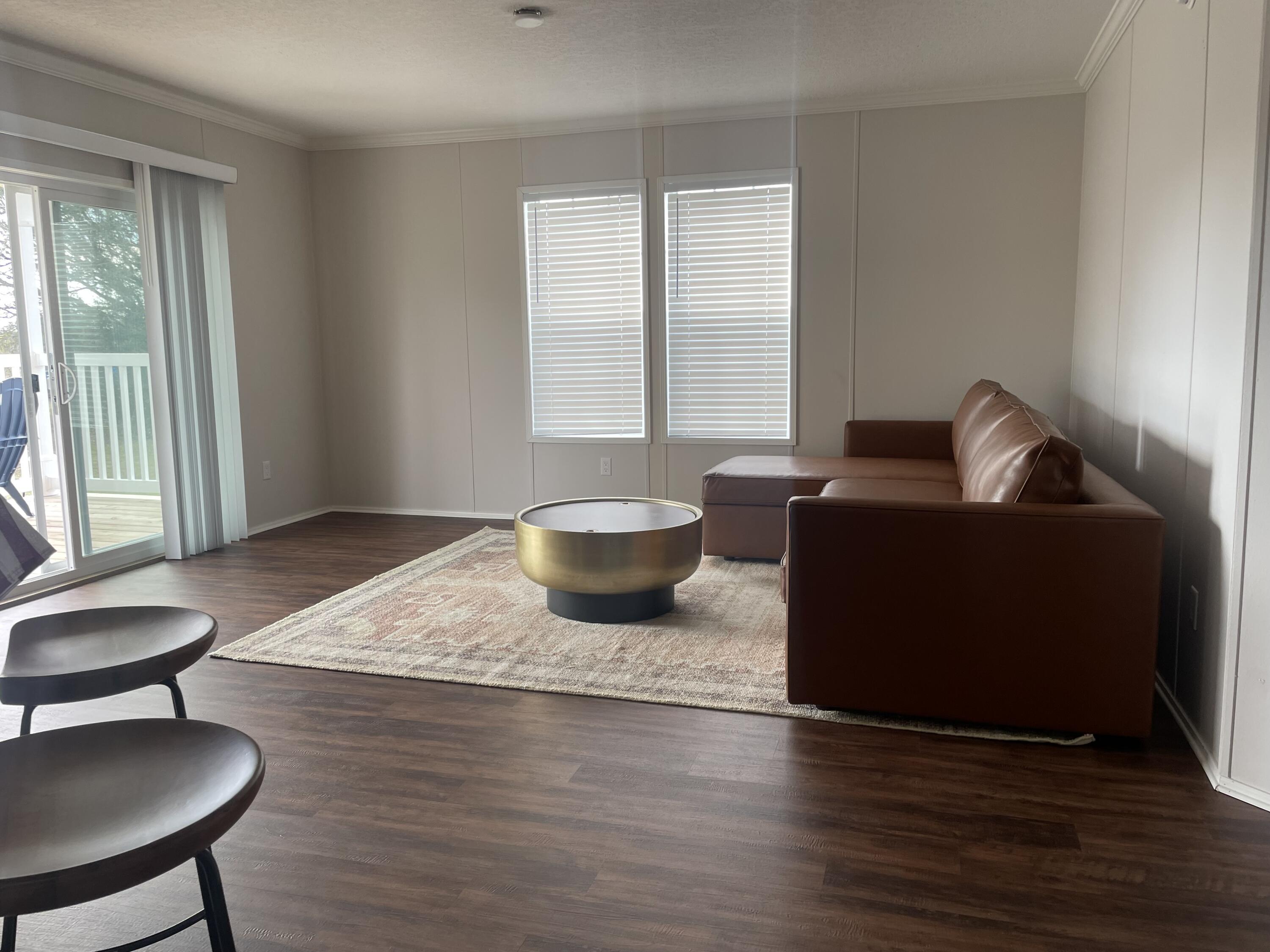 18459 260th Street Okeechobee, FL 34972 - Photo 8 of 15 a living room with furniture and a window