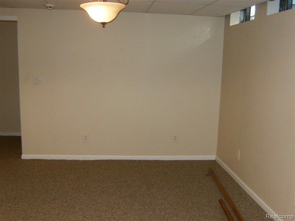 267 Marmoor Court, Unit 25 Rochester, MI 48309 - Photo 11 of 14 MARMOOR BASEMENT ROOM.JPG