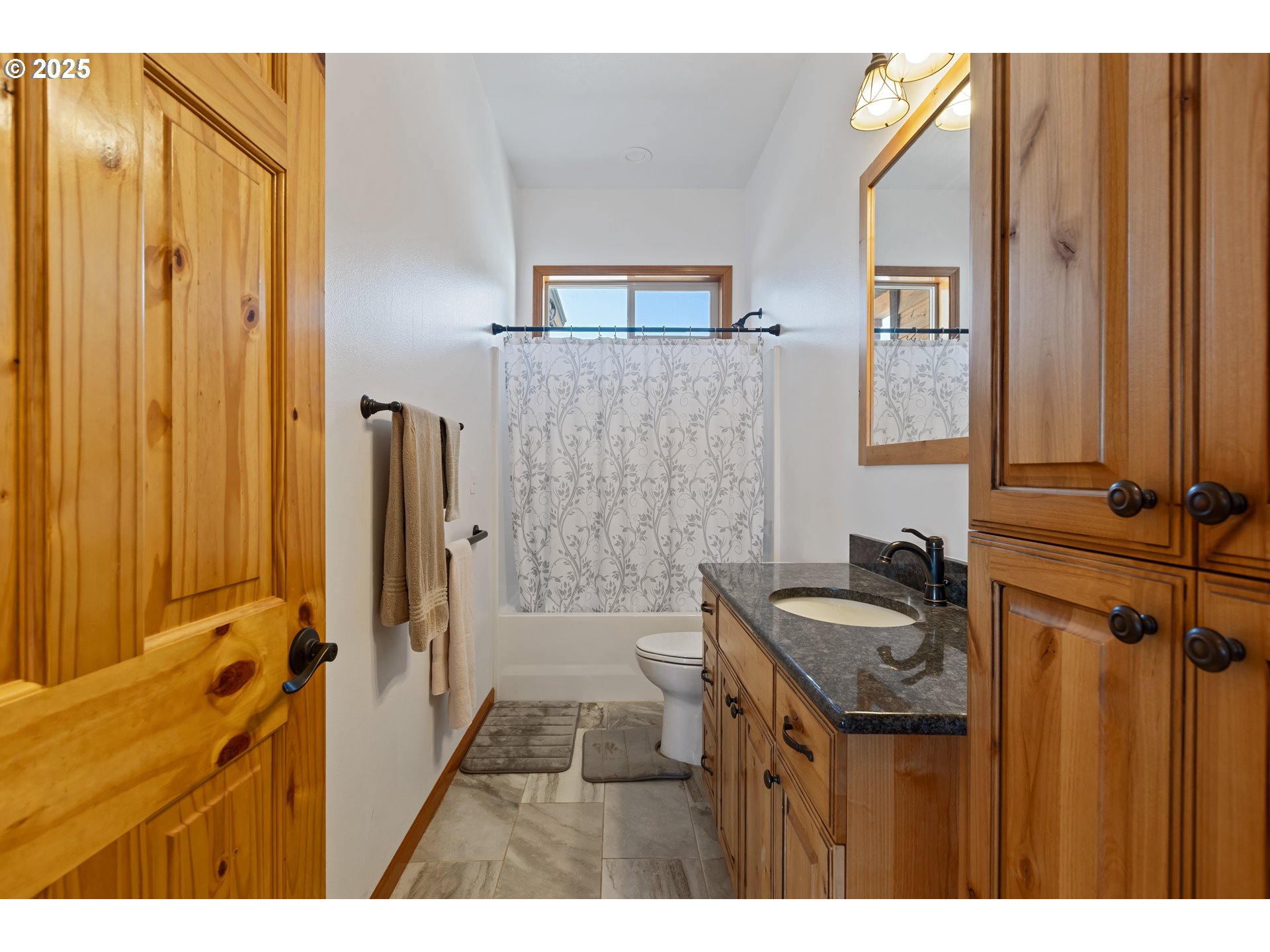 1757 Riddle Bypass Road Riddle, OR 97469 - Photo 18 of 38 a bathroom with a sink and a mirror