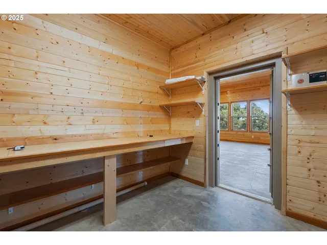 a utility room with faucet washer and dryer