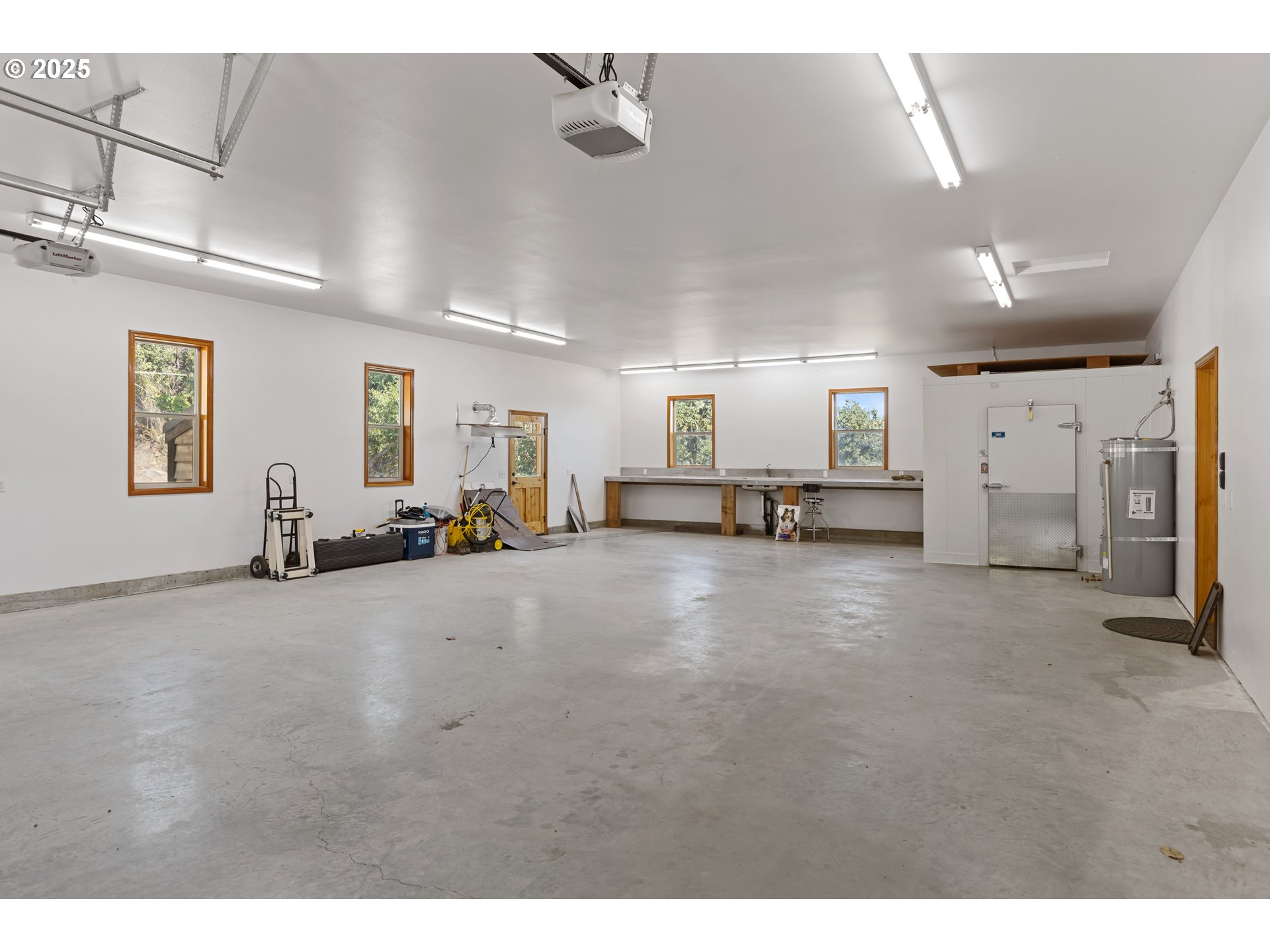 1757 Riddle Bypass Road Riddle, OR 97469 - Photo 27 of 38 a view of a livingroom with furniture and a ceiling fan