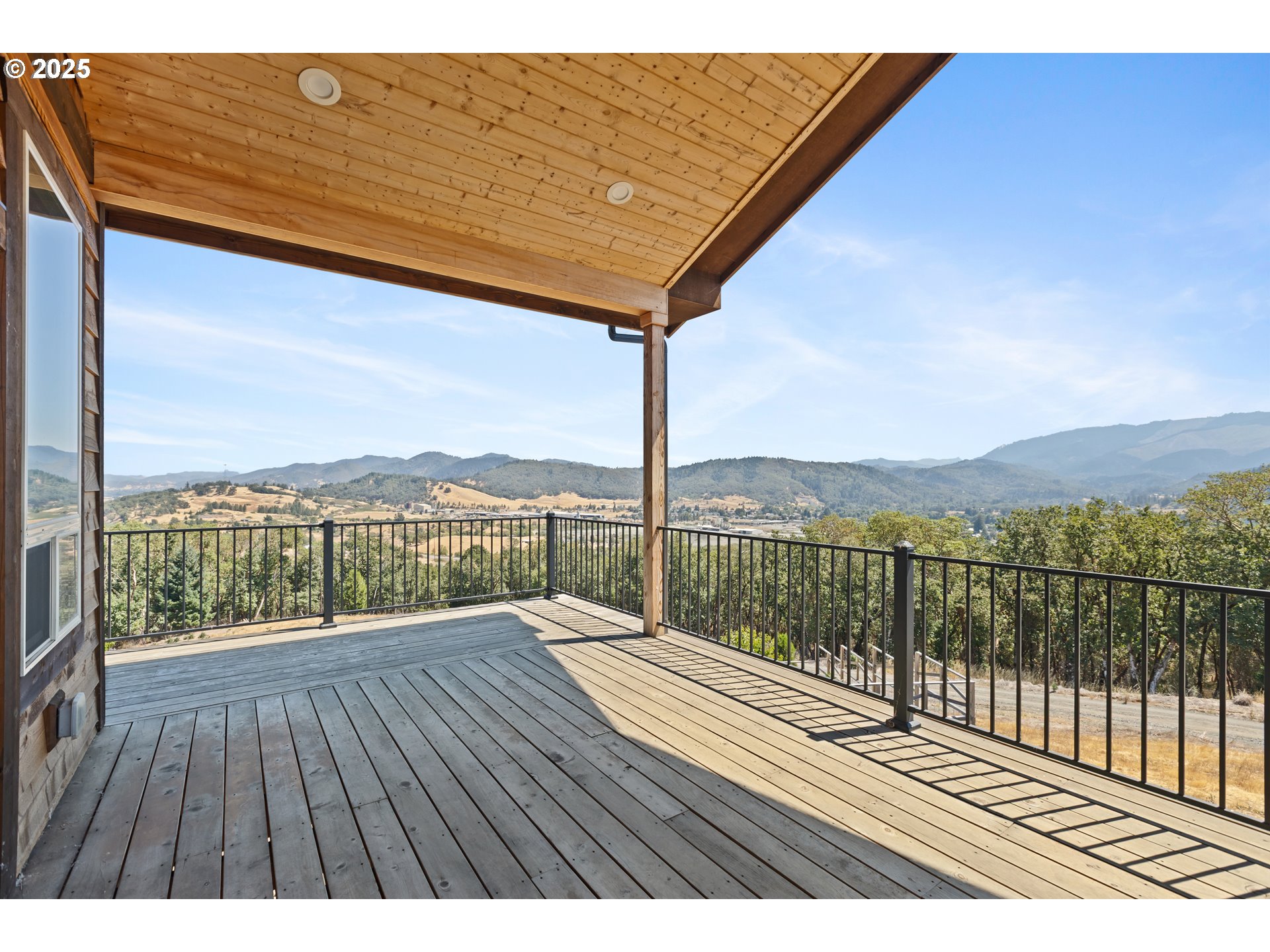 1757 Riddle Bypass Road Riddle, OR 97469 - Photo 30 of 38 a view of balcony with wooden floor