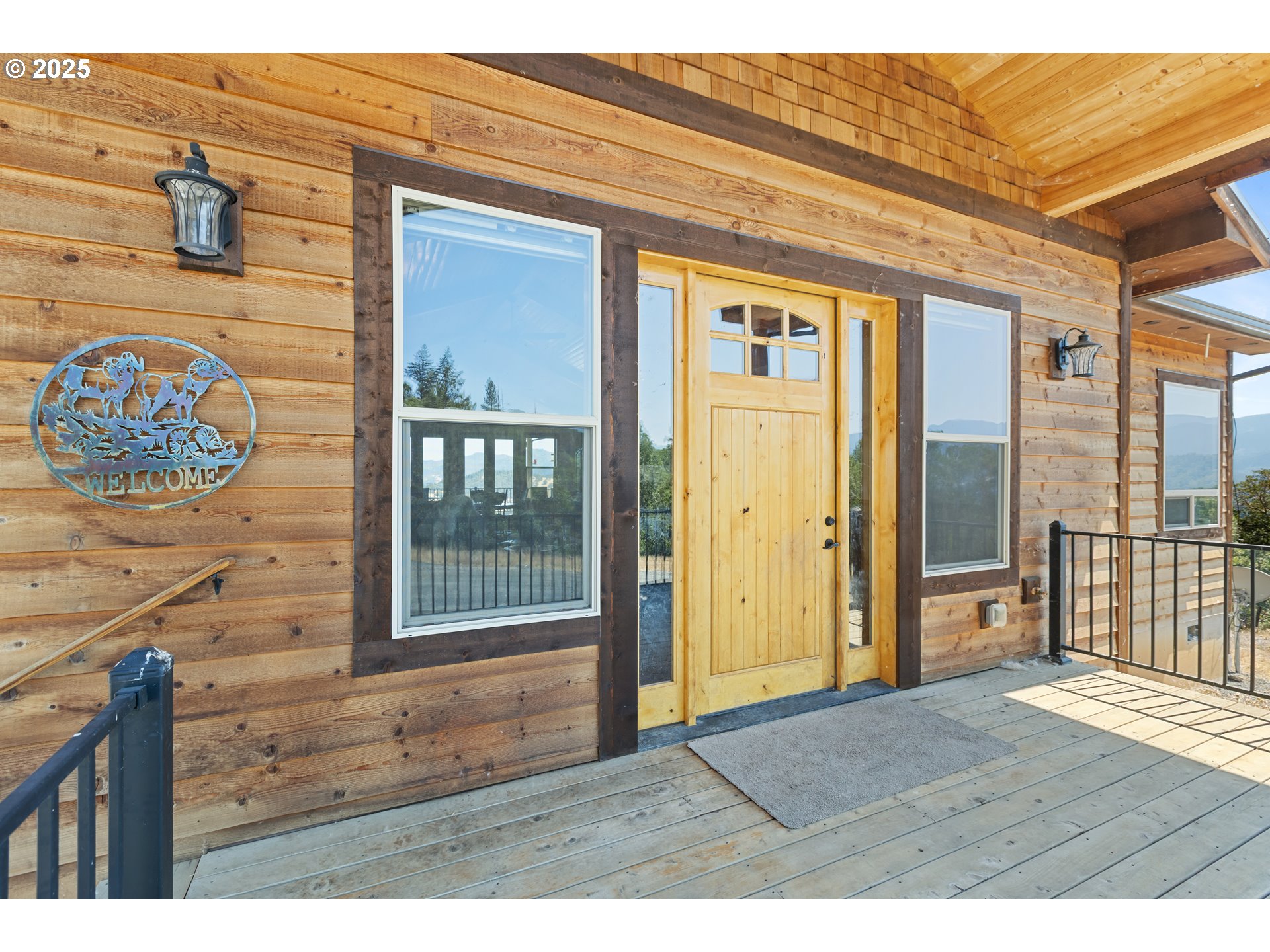 1757 Riddle Bypass Road Riddle, OR 97469 - Photo 3 of 38 a view of front door of house