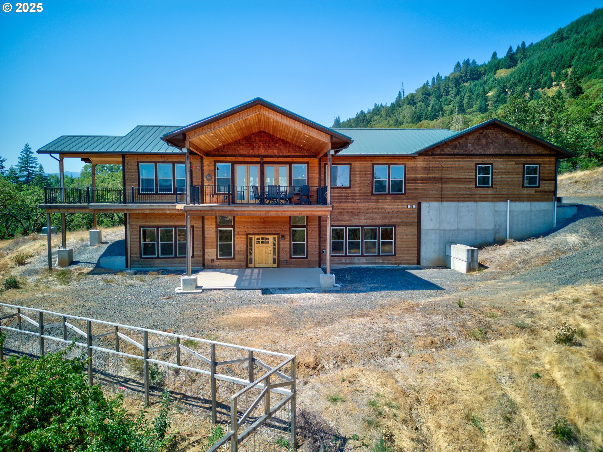 1757 Riddle Bypass Road Riddle, OR 97469 - Photo 35 of 38 a front view of a house with a yard