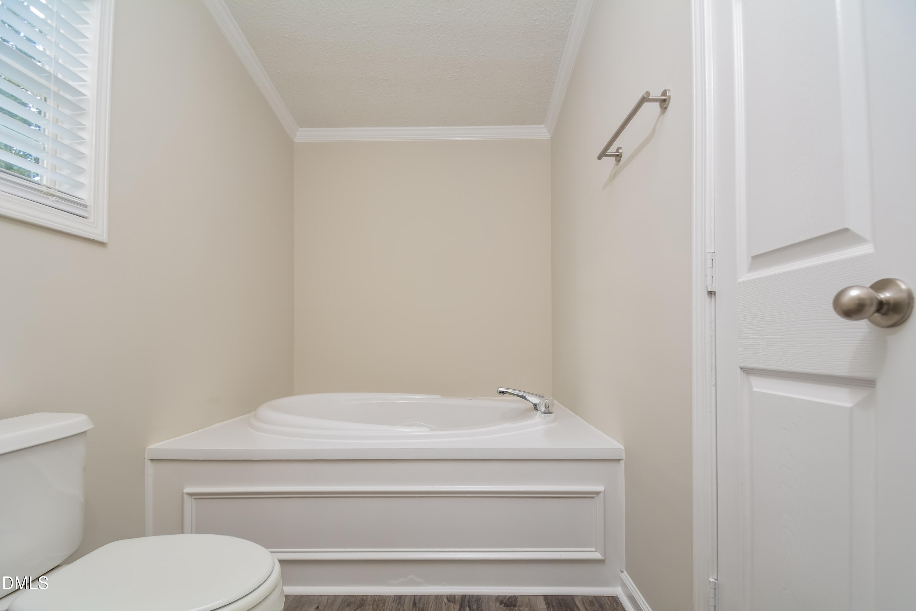 617 East Walnut Avenue Wake Forest, NC 27587 - Photo 10 of 16 a bathroom with a toilet and a shower