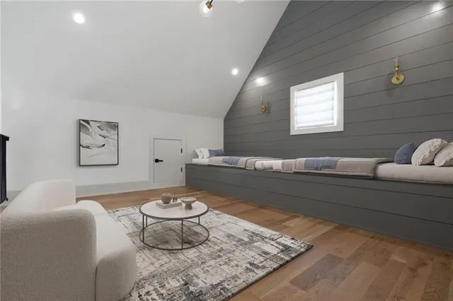 a living room with furniture and a rug