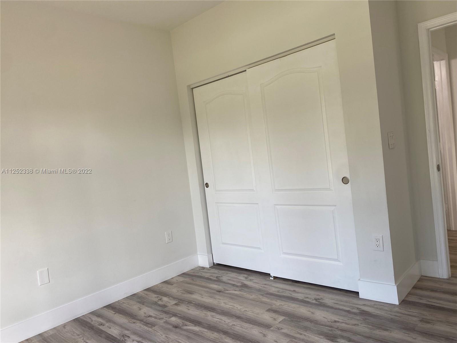 16350 Southwest 50th Terrace Miami, FL 33185 - Photo 17 of 59 a view of an empty room