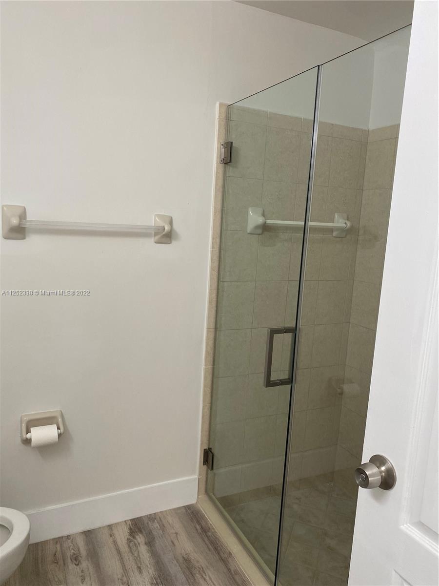 16350 Southwest 50th Terrace Miami, FL 33185 - Photo 19 of 59 a bathroom with a shower