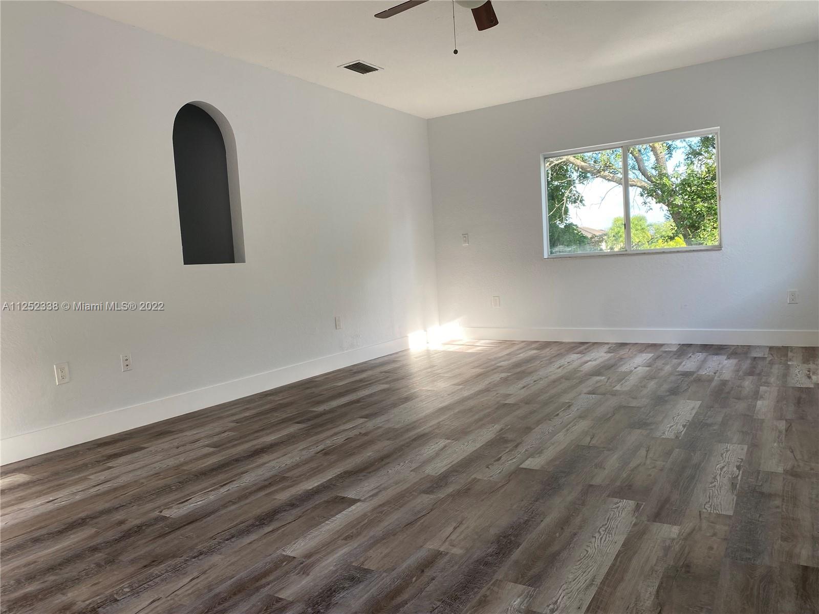 16350 Southwest 50th Terrace Miami, FL 33185 - Photo 22 of 59 wooden floor in a room