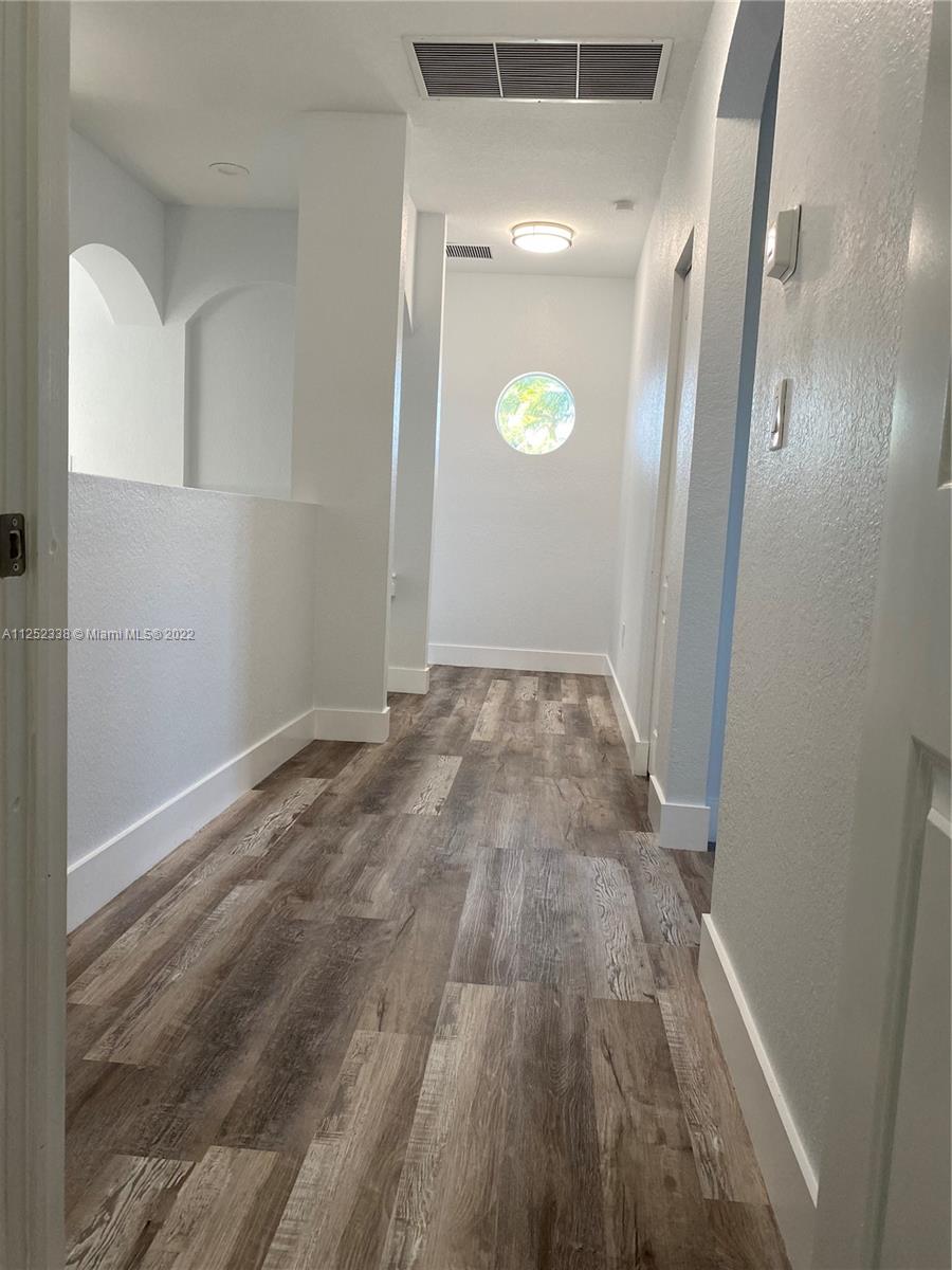 16350 Southwest 50th Terrace Miami, FL 33185 - Photo 29 of 59 an empty room with wooden floor