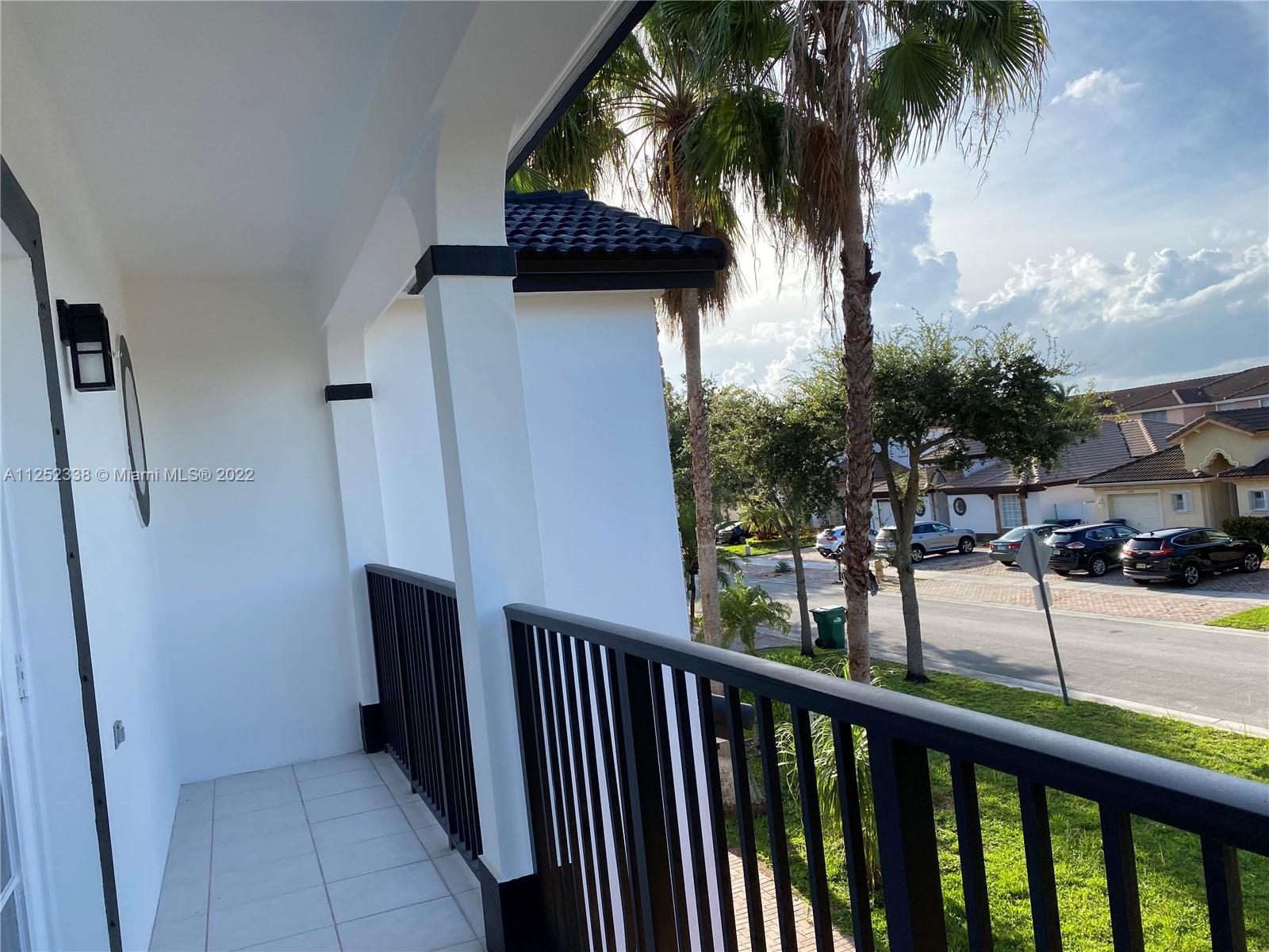16350 Southwest 50th Terrace Miami, FL 33185 - Photo 33 of 59 a view of balcony with a potted plant