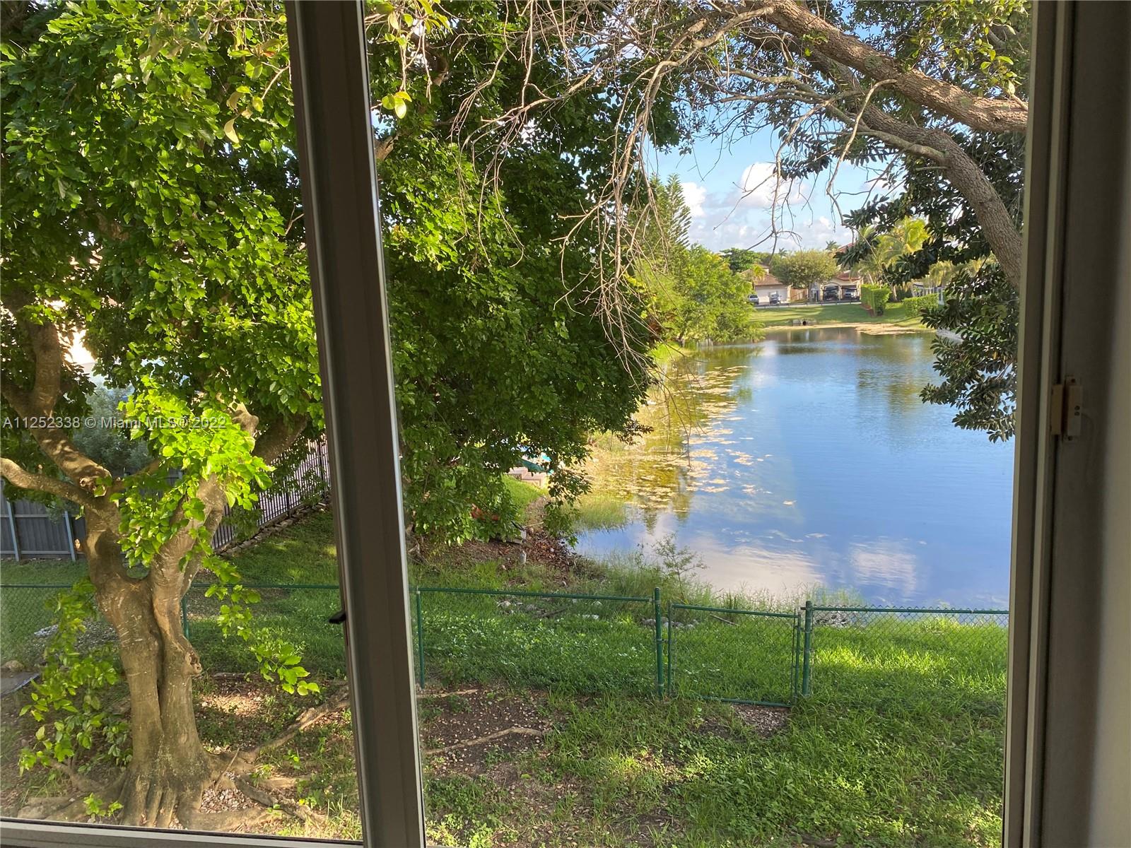 16350 Southwest 50th Terrace Miami, FL 33185 - Photo 45 of 59 a view of lake from a yard
