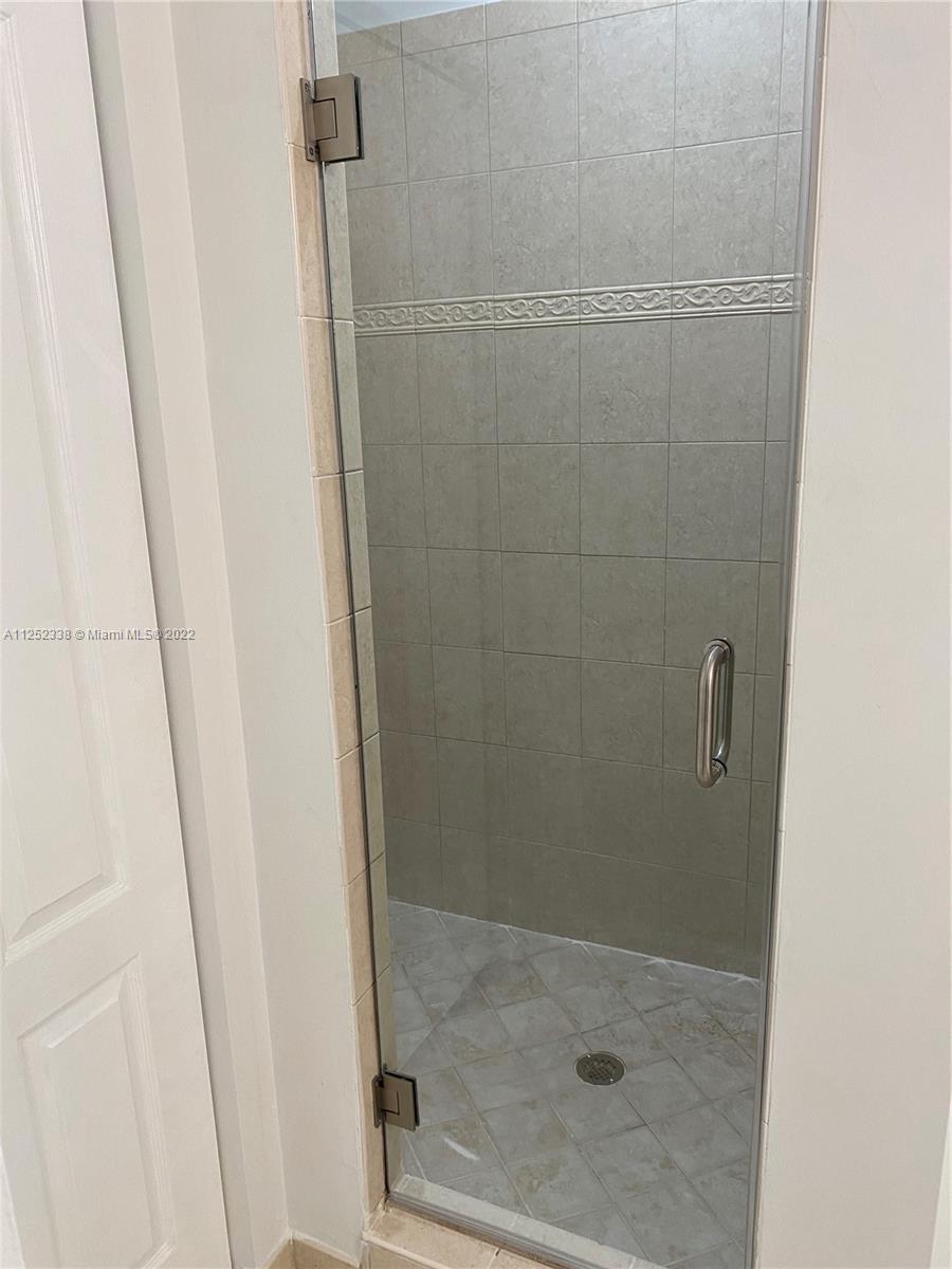 16350 Southwest 50th Terrace Miami, FL 33185 - Photo 49 of 59 a bathroom with a shower