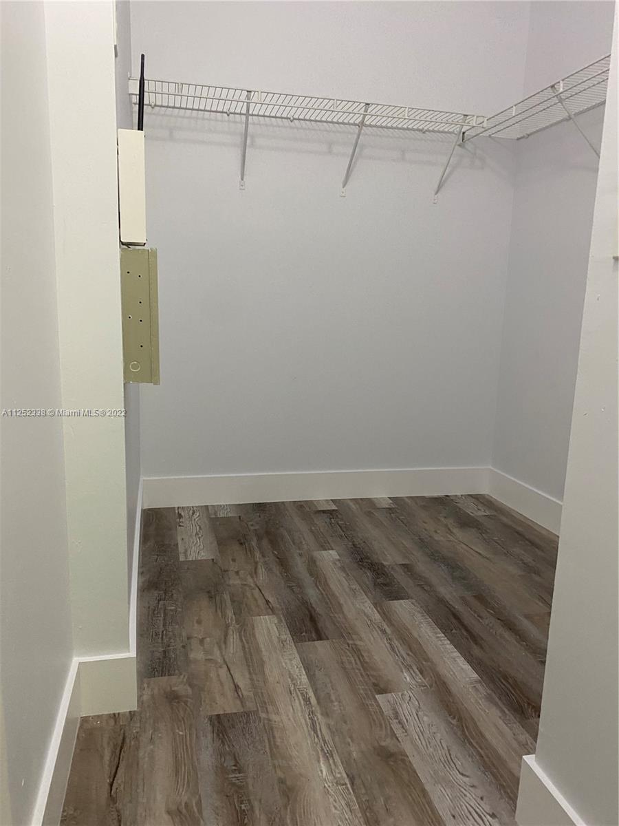 16350 Southwest 50th Terrace Miami, FL 33185 - Photo 51 of 59 a view of a room with wooden floor