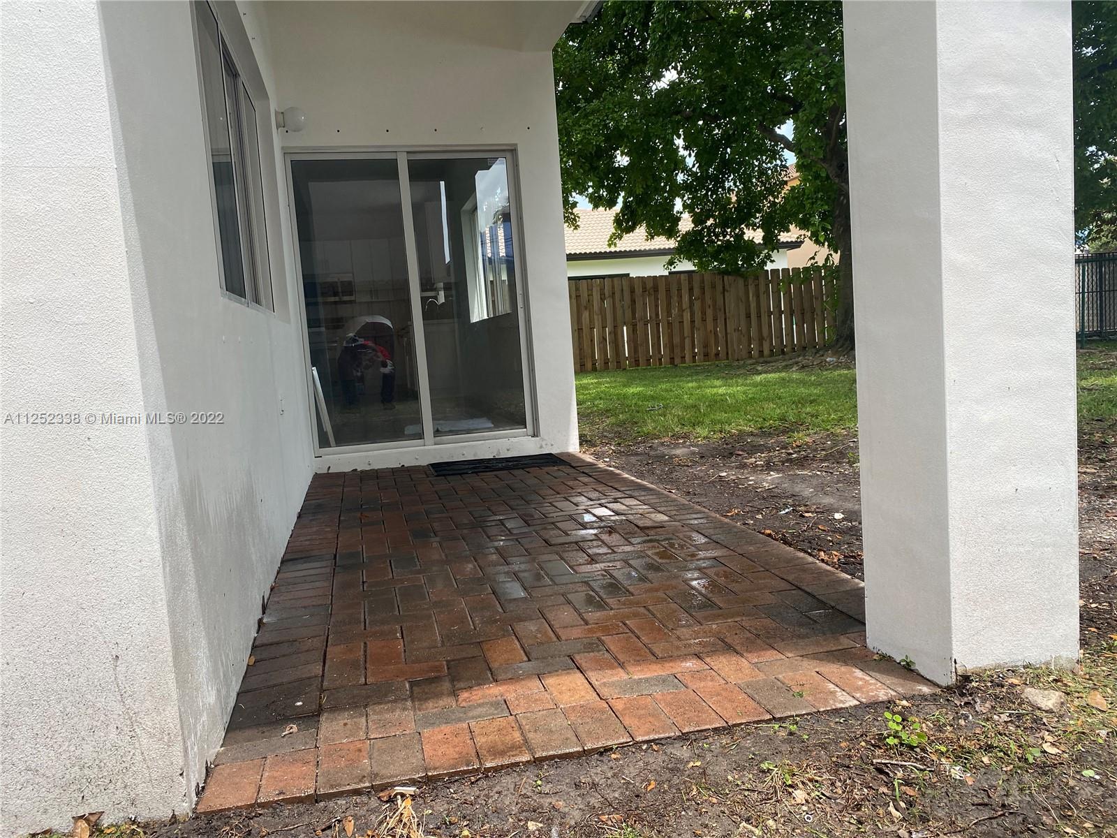 16350 Southwest 50th Terrace Miami, FL 33185 - Photo 53 of 59 a view of a house with a yard