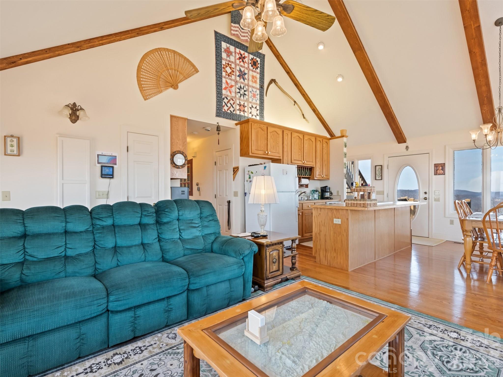 1007 Turkey Trot Road Clyde, NC 28721 - Photo 18 of 48 a living room with furniture and a rug