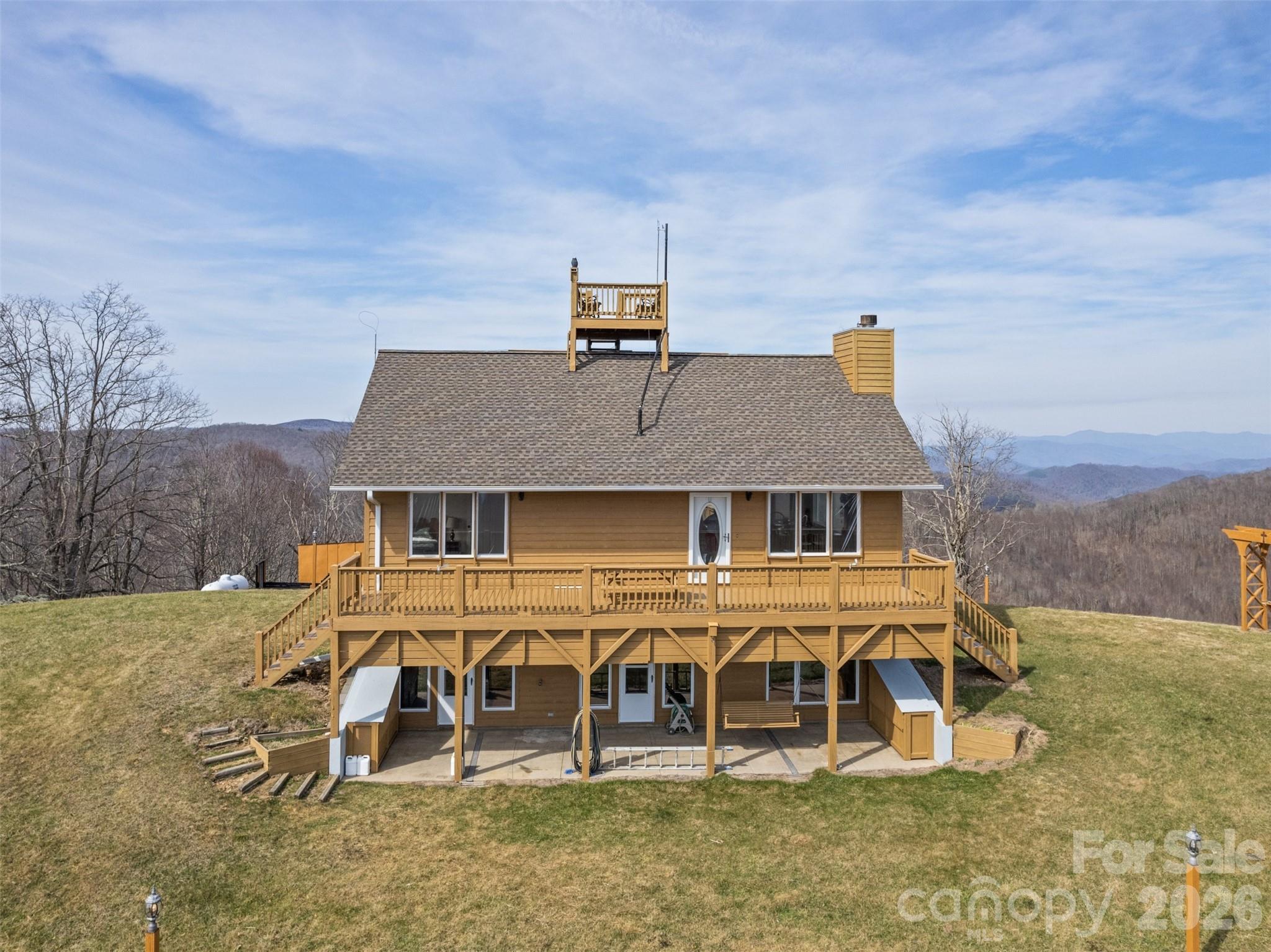 1007 Turkey Trot Road Clyde, NC 28721 - Photo 2 of 48 front view of a house with a yard