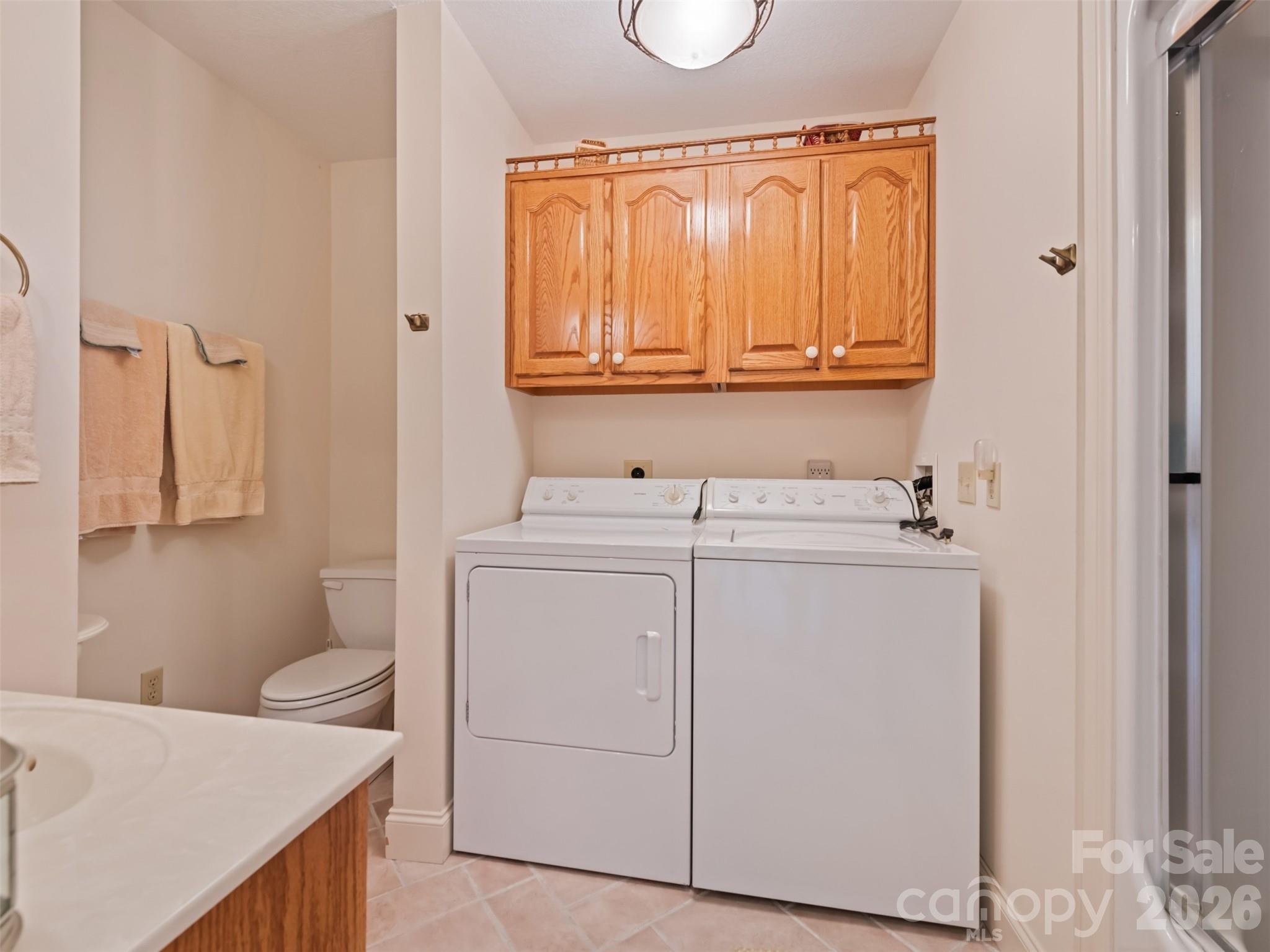 1007 Turkey Trot Road Clyde, NC 28721 - Photo 24 of 48 a utility room with dryer and washer