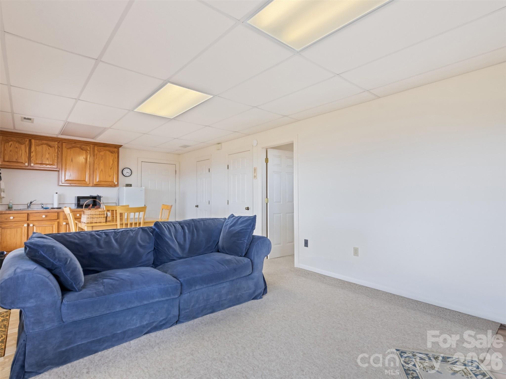 1007 Turkey Trot Road Clyde, NC 28721 - Photo 27 of 48 a living room with a couch