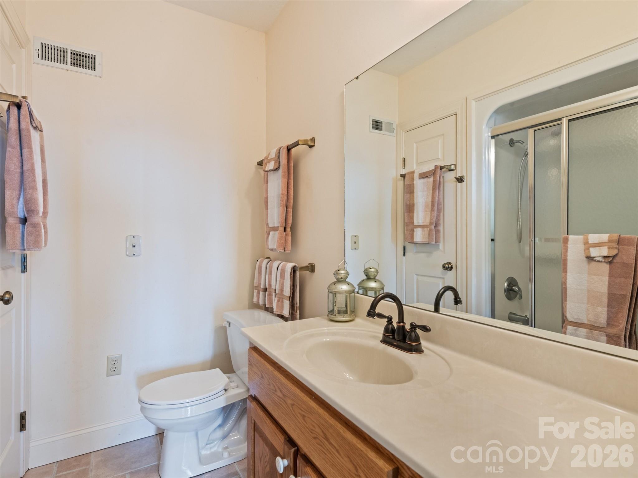 1007 Turkey Trot Road Clyde, NC 28721 - Photo 34 of 48 a bathroom with a sink toilet and shower