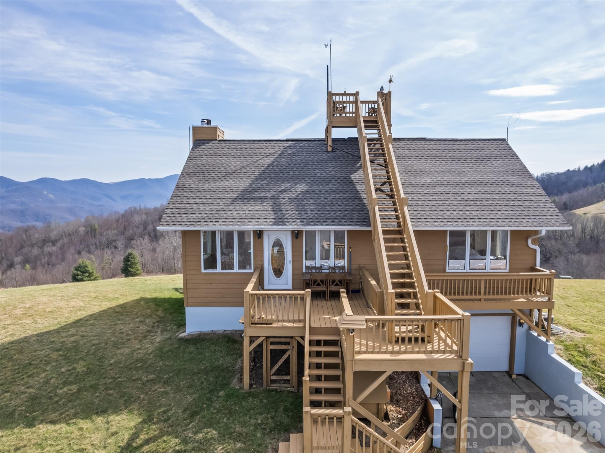 1007 Turkey Trot Road Clyde, NC 28721 - Photo 5 of 48 front view of house with a yard
