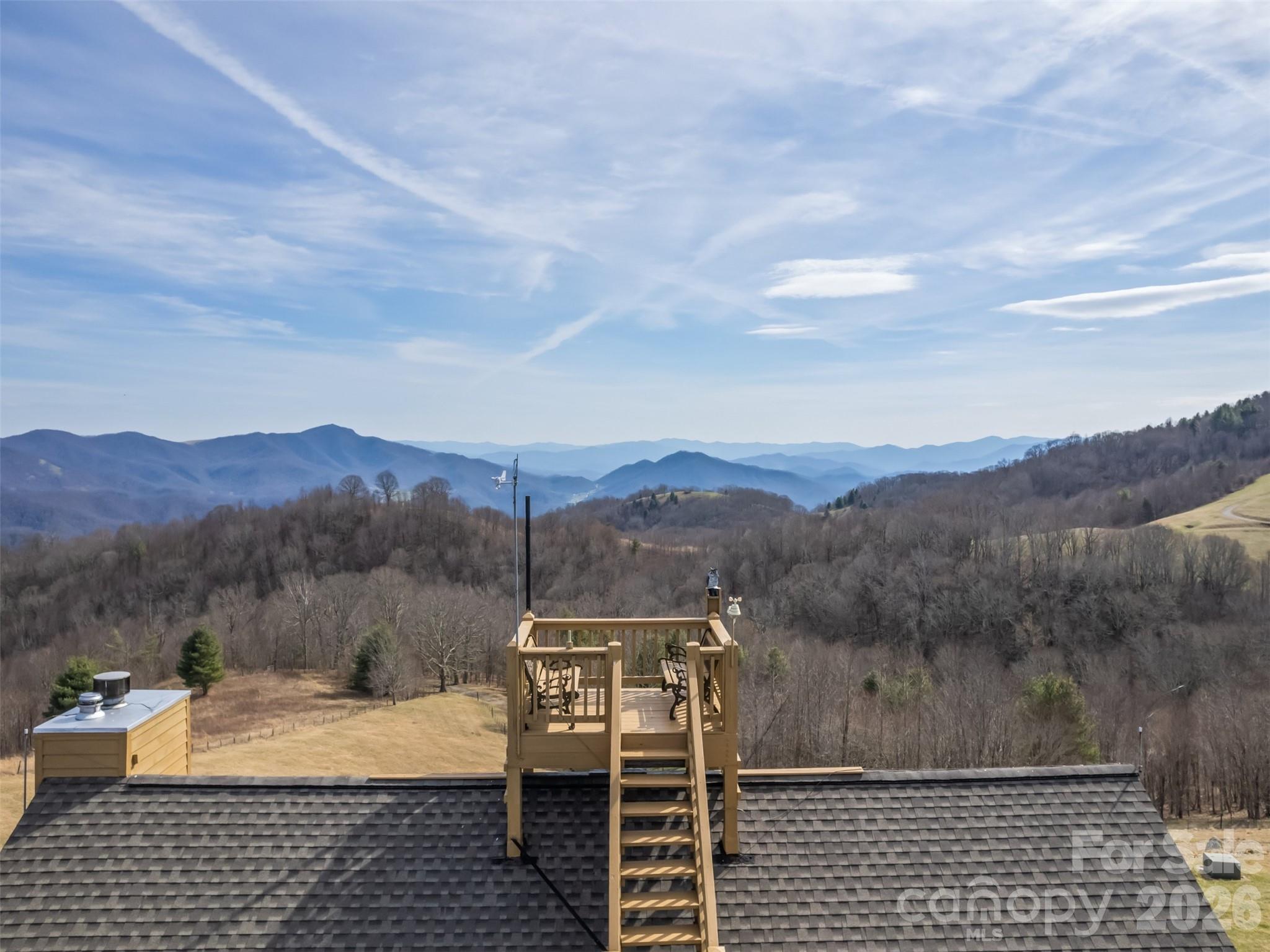 1007 Turkey Trot Road Clyde, NC 28721 - Photo 6 of 48 a view of a terrace with a mountain